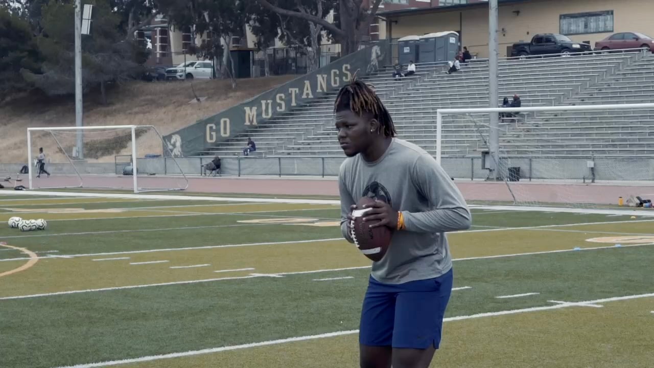 Elite quarterback training session on the field in Los Angeles with Coach Bass
